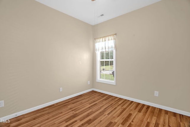 7807 Braefield Dr, Raleigh, NC 27616 - unfurnished room with baseboards and light wood-type flooring