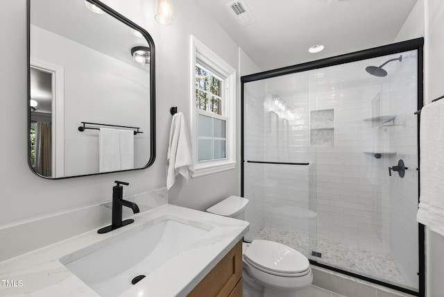 2704 Farnborough Rd, Raleigh, NC 27613 - bathroom featuring vanity and a shower stall