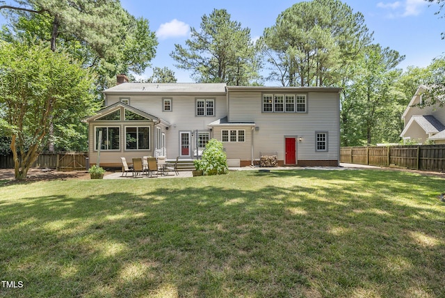 2704 Farnborough Rd, Raleigh, NC 27613 - back of house featuring a chimney, a patio, entry steps, and a fenced backyard