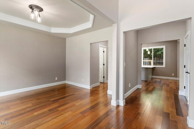 7414 Brandon Allen Ave, Raleigh, NC 27613 - spare room featuring hardwood / wood-style flooring and baseboards