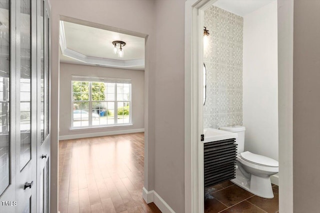 7414 Brandon Allen Ave, Raleigh, NC 27613 - bathroom featuring toilet and wood finished floors