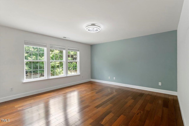 7414 Brandon Allen Ave, Raleigh, NC 27613 - spare room featuring wood-type flooring