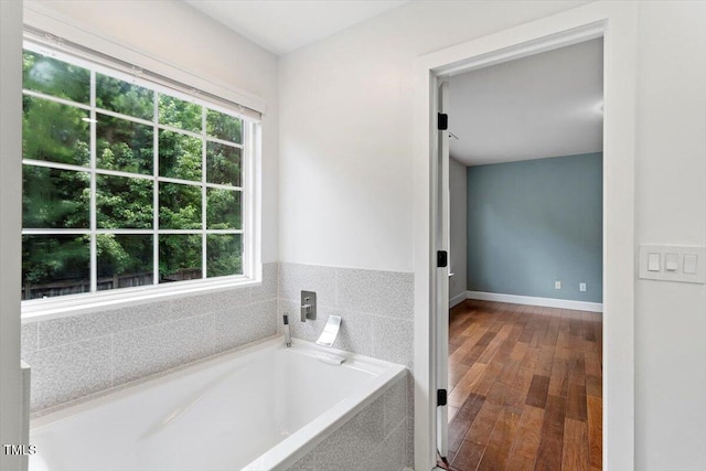 7414 Brandon Allen Ave, Raleigh, NC 27613 - full bathroom with a bath and wood finished floors