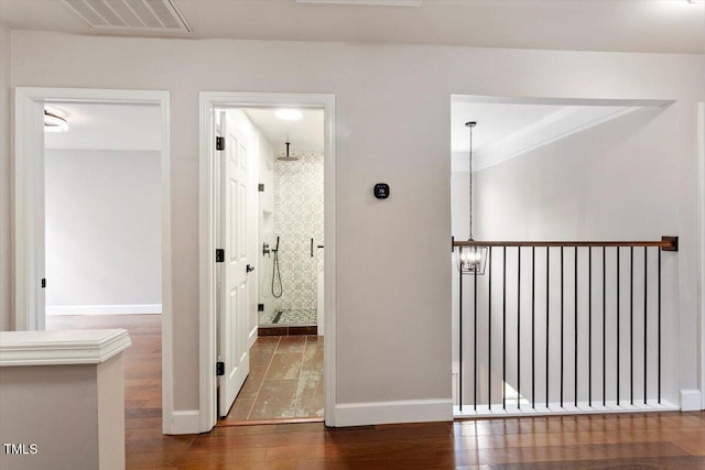 7414 Brandon Allen Ave, Raleigh, NC 27613 - corridor with wood finished floors and baseboards