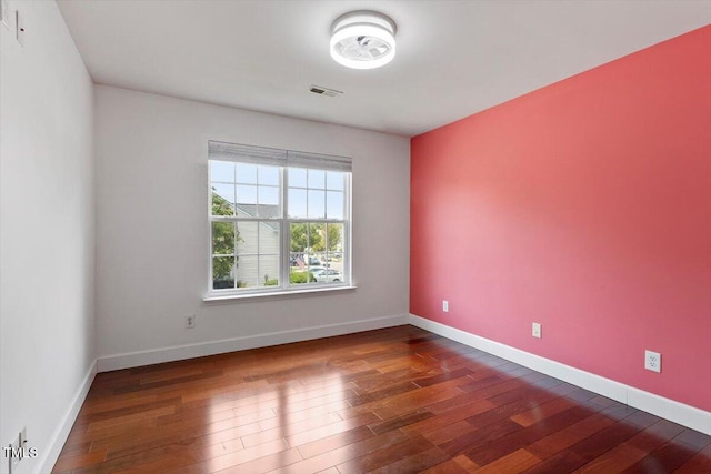 7414 Brandon Allen Ave, Raleigh, NC 27613 - empty room with hardwood / wood-style flooring and baseboards