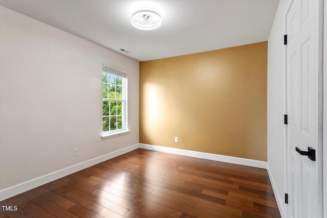 7414 Brandon Allen Ave, Raleigh, NC 27613 - unfurnished room with wood-type flooring and baseboards