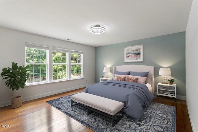 7414 Brandon Allen Ave, Raleigh, NC 27613 - bedroom featuring baseboards and wood-type flooring