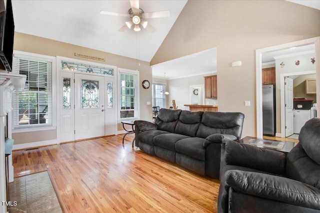 8101 Claybrooke Ct, Willow Springs, NC 27592 - living area with light wood-style floors, ceiling fan, and high vaulted ceiling