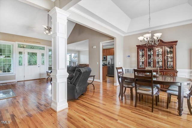 8101 Claybrooke Ct, Willow Springs, NC 27592 - dining area with ornate columns, light wood-style floors, a chandelier, a ceiling fan, and ornamental molding