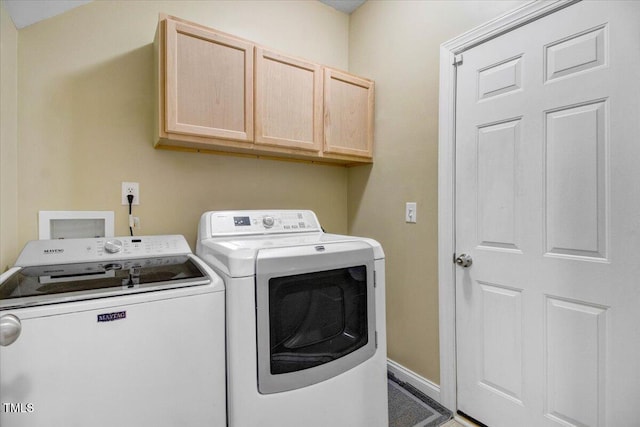 8101 Claybrooke Ct, Willow Springs, NC 27592 - laundry area with cabinet space and washing machine and clothes dryer