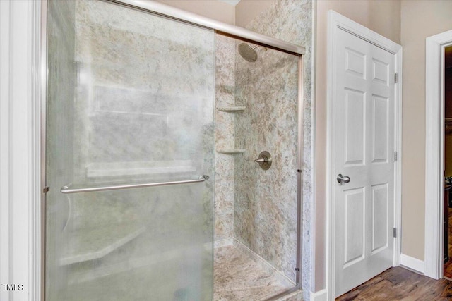 8101 Claybrooke Ct, Willow Springs, NC 27592 - full bathroom featuring a shower stall, wood finished floors, and a closet