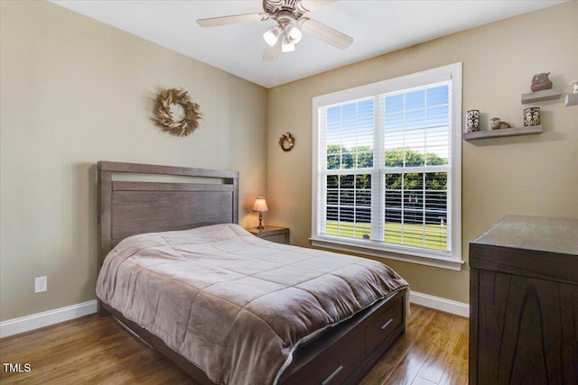 8101 Claybrooke Ct, Willow Springs, NC 27592 - bedroom with wood finished floors and ceiling fan