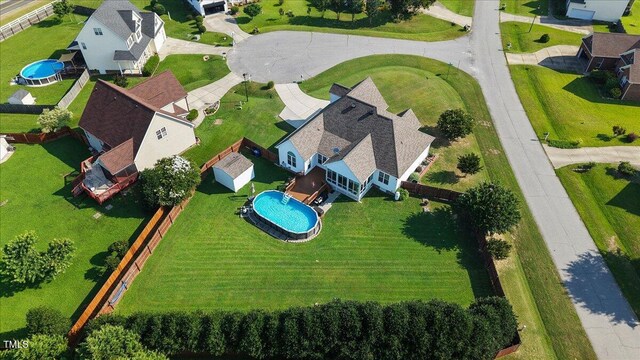 8101 Claybrooke Ct, Willow Springs, NC 27592 - aerial perspective of suburban area with a pool area
