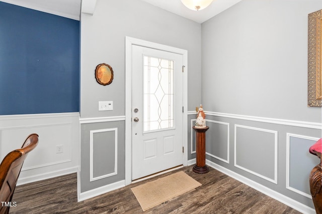 78 N Porcenna Ln, Clayton, NC 27527 - entrance foyer featuring a decorative wall, wainscoting, and dark wood-style floors