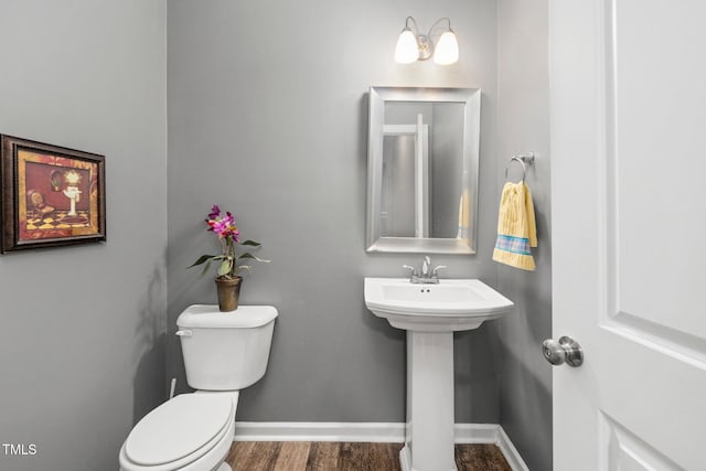 78 N Porcenna Ln, Clayton, NC 27527 - half bathroom with toilet and wood finished floors