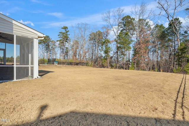 78 N Porcenna Ln, Clayton, NC 27527 - view of yard featuring a sunroom and ceiling fan