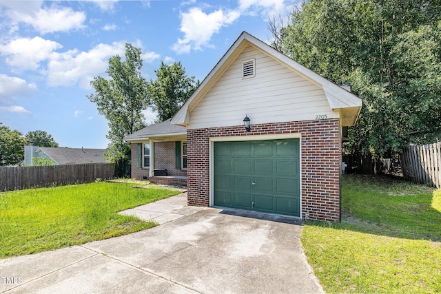 2205 Indigo Bush Pl, Fayetteville, NC 28304 - view of front of home with brick siding, concrete driveway, and a garage