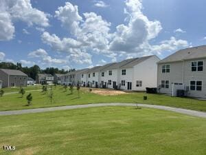 133 N Chubb Rdg, Wilsons Mills, NC 27520 - surrounding community with a lawn and a residential view