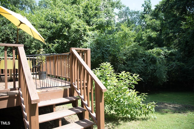 4028 Chaucer Dr, Durham, NC 27705 - deck with stairs and a lawn