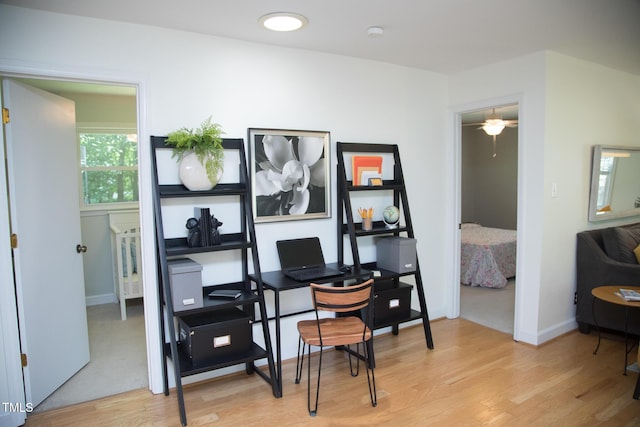4028 Chaucer Dr, Durham, NC 27705 - home office featuring light wood-type flooring and baseboards