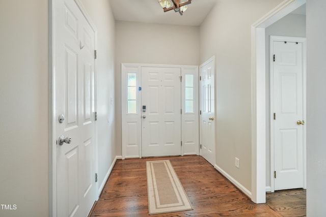 8532 Swarthmore Dr, Raleigh, NC 27615 - foyer entrance with dark wood-type flooring and baseboards