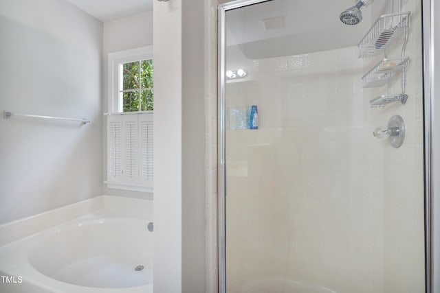 8532 Swarthmore Dr, Raleigh, NC 27615 - bathroom with a stall shower and a garden tub