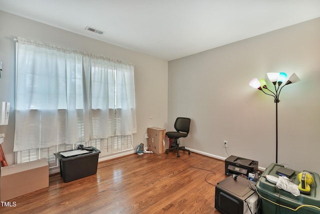 8532 Swarthmore Dr, Raleigh, NC 27615 - misc room with wood finished floors and baseboards