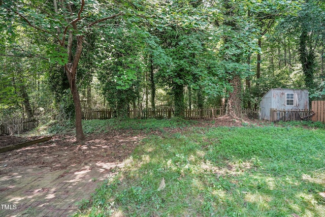 8532 Swarthmore Dr, Raleigh, NC 27615 - fenced backyard featuring a storage unit