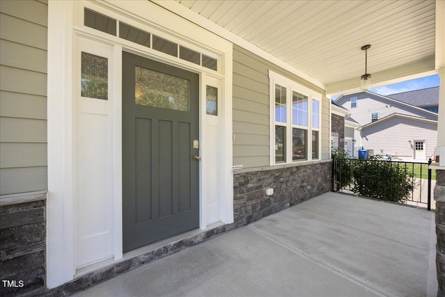 2223 Copper Pond Way, Fuquay Varina, NC 27526 - entrance to property with covered porch and stone siding