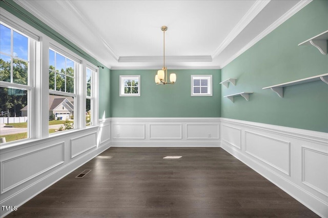 2223 Copper Pond Way, Fuquay Varina, NC 27526 - unfurnished dining area with a chandelier, dark wood-style flooring, wainscoting, crown molding, and a raised ceiling