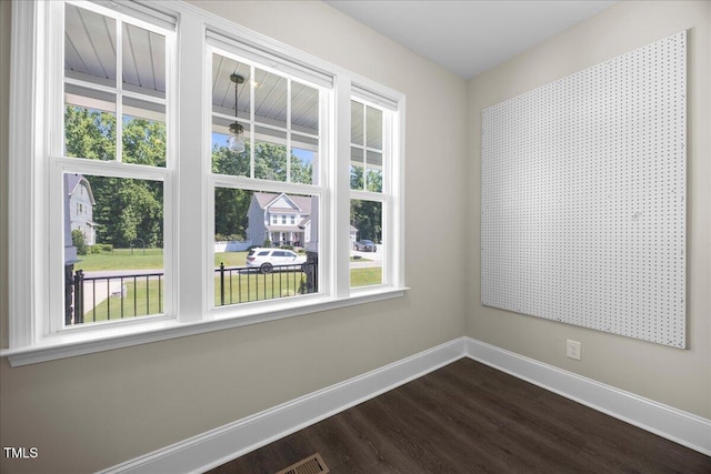 2223 Copper Pond Way, Fuquay Varina, NC 27526 - spare room with dark wood-style flooring and baseboards