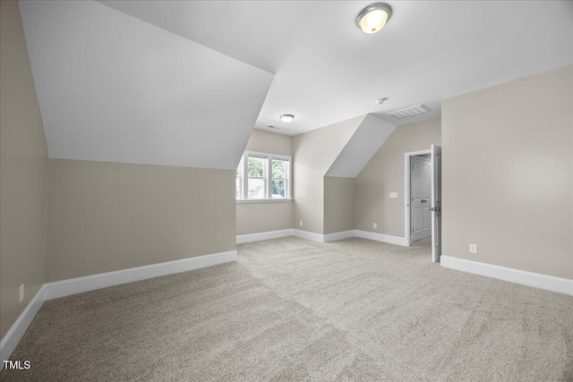 2223 Copper Pond Way, Fuquay Varina, NC 27526 - additional living space featuring vaulted ceiling and light carpet