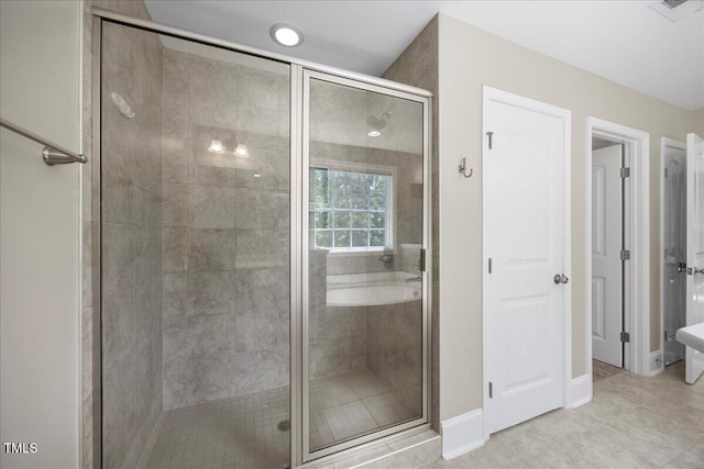 2223 Copper Pond Way, Fuquay Varina, NC 27526 - bathroom with a stall shower and tile patterned floors