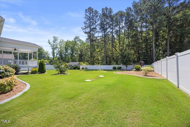 2223 Copper Pond Way, Fuquay Varina, NC 27526 - fenced backyard featuring ceiling fan