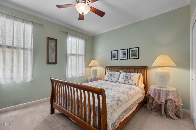 2104 Brockfield Ct, Raleigh, NC 27614 - carpeted bedroom featuring crown molding and a ceiling fan