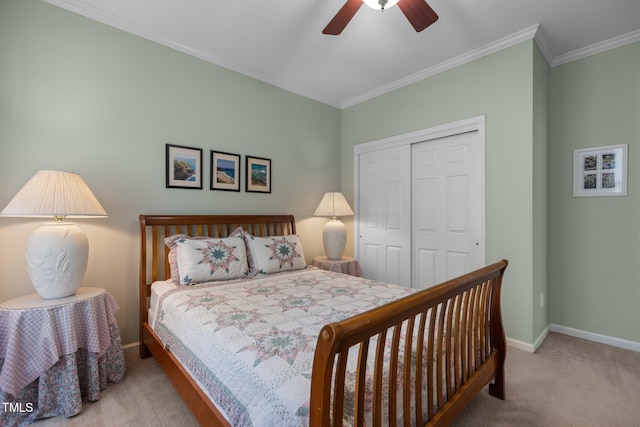 2104 Brockfield Ct, Raleigh, NC 27614 - carpeted bedroom featuring a closet, ornamental molding, and a ceiling fan