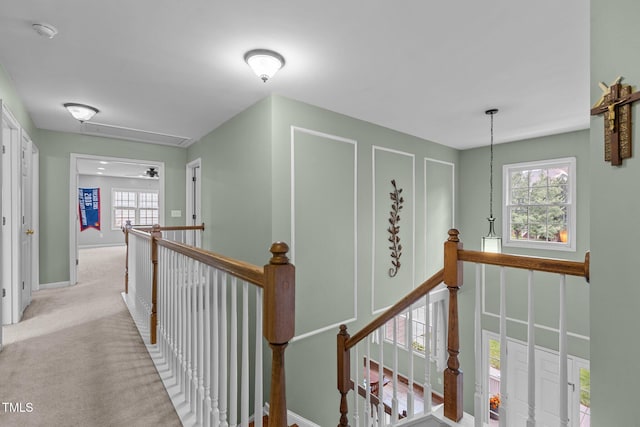 2104 Brockfield Ct, Raleigh, NC 27614 - hallway featuring an upstairs landing, attic access, and plenty of natural light