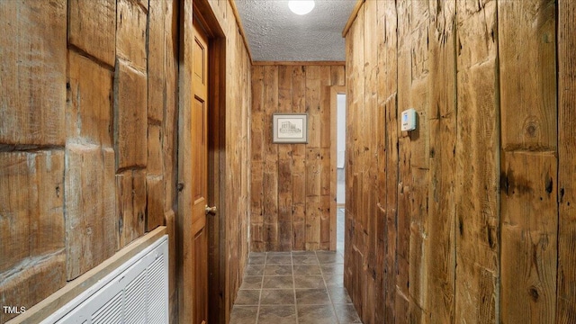 424 Roy Carver Rd, Semora, NC 27343 - hall with wooden walls and a textured ceiling