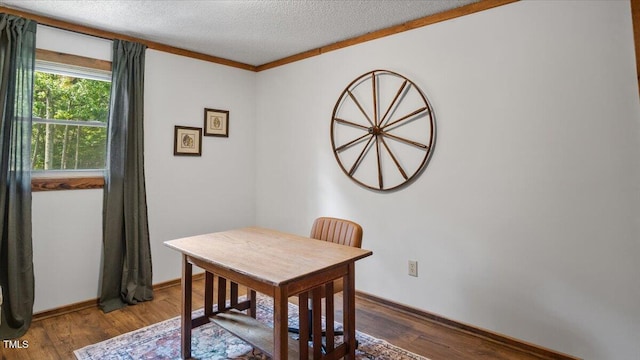 424 Roy Carver Rd, Semora, NC 27343 - office area with wood finished floors, a textured ceiling, and crown molding