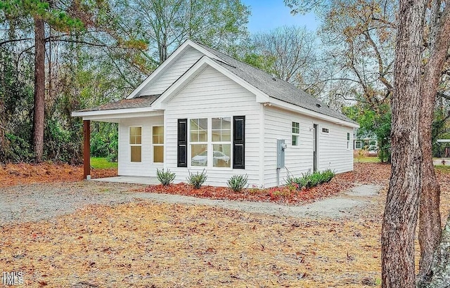 900 Woodrow St S, Wilson, NC 27893 - view of side of home featuring roof with shingles