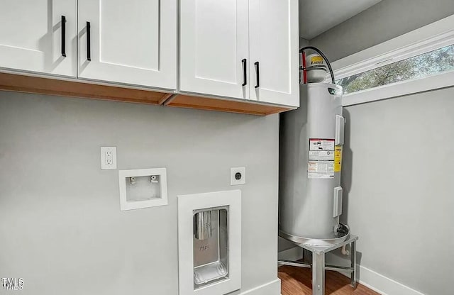 900 Woodrow St S, Wilson, NC 27893 - laundry area featuring electric dryer hookup, cabinet space, washer hookup, wood finished floors, and water heater