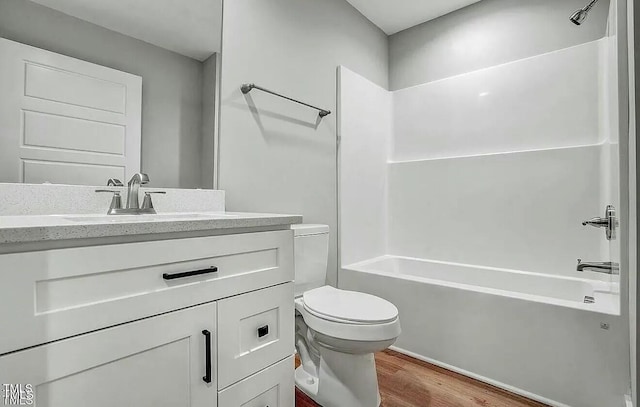 900 Woodrow St S, Wilson, NC 27893 - bathroom featuring wood finished floors,  shower combination, and vanity