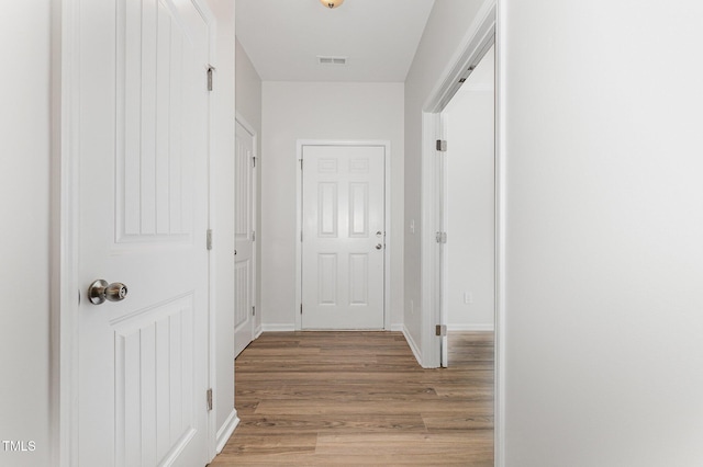 14309 Foxcroft Rd, Raleigh, NC 27614 - hall featuring light wood-style flooring and baseboards