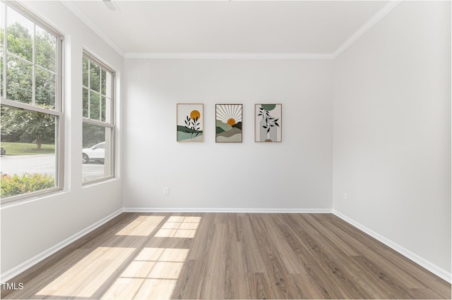 14309 Foxcroft Rd, Raleigh, NC 27614 - spare room with ornamental molding and wood finished floors