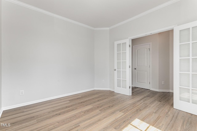 14309 Foxcroft Rd, Raleigh, NC 27614 - empty room with french doors, ornamental molding, and light wood-style flooring