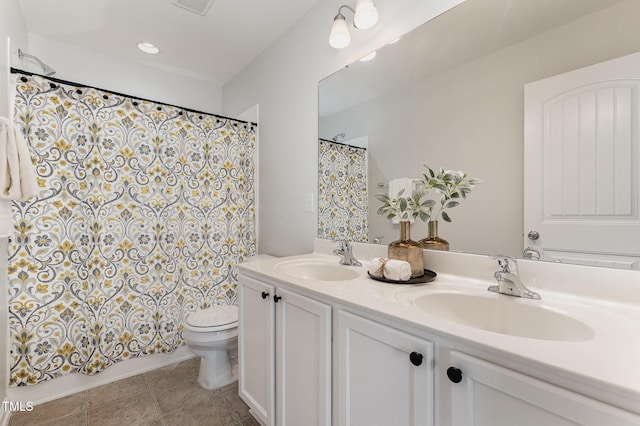 14309 Foxcroft Rd, Raleigh, NC 27614 - full bathroom featuring toilet and double vanity