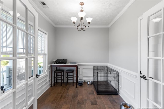 4112 Newgate St, Fayetteville, NC 28306 - unfurnished office with a chandelier, wood finished floors, crown molding, a textured ceiling, and a wainscoted wall