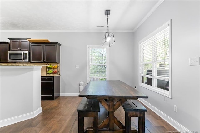 4112 Newgate St, Fayetteville, NC 28306 - dining room featuring dark wood-type flooring and ornamental molding