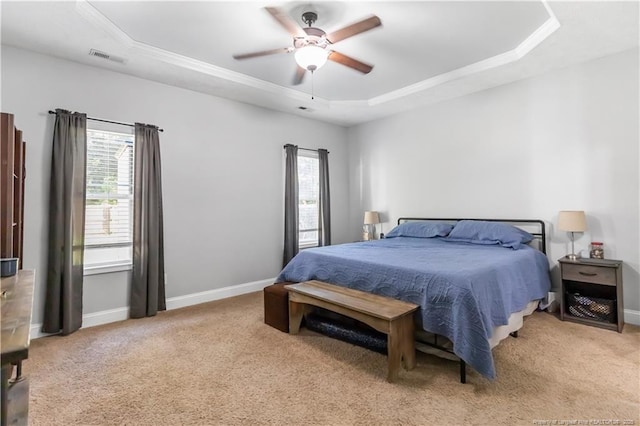 4112 Newgate St, Fayetteville, NC 28306 - bedroom with a tray ceiling, multiple windows, carpet floors, ceiling fan, and ornamental molding