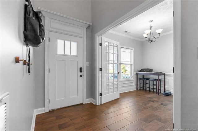 4112 Newgate St, Fayetteville, NC 28306 - foyer entrance with ornamental molding and a chandelier
